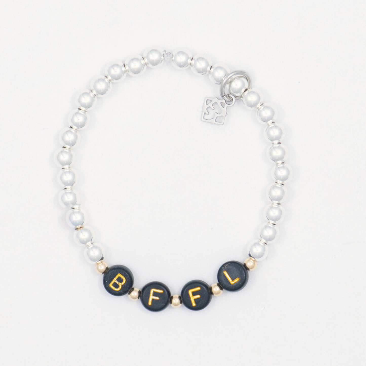 Beaded bracelet with black beads displaying 'BFFL' on a white background