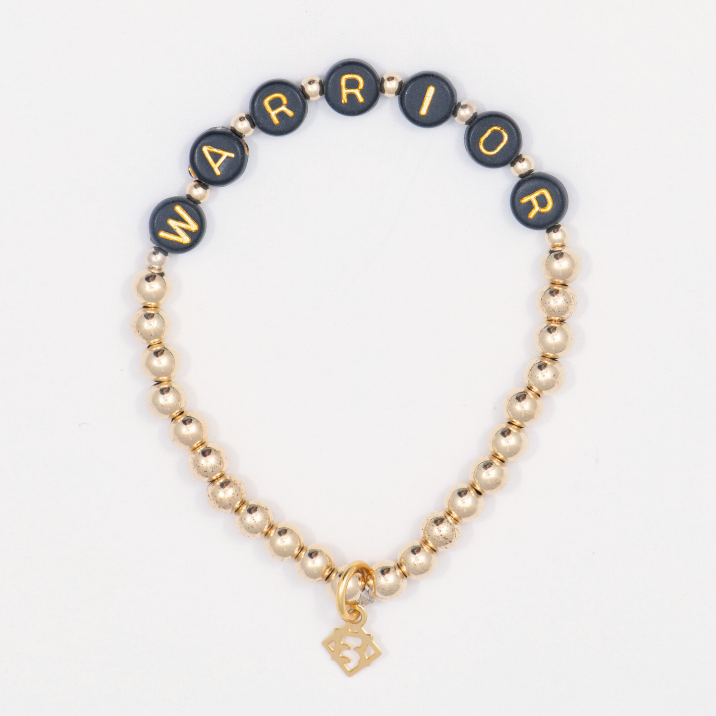 Bracelet with black beads spelling 'WARRIOR' and gold accents on a white background