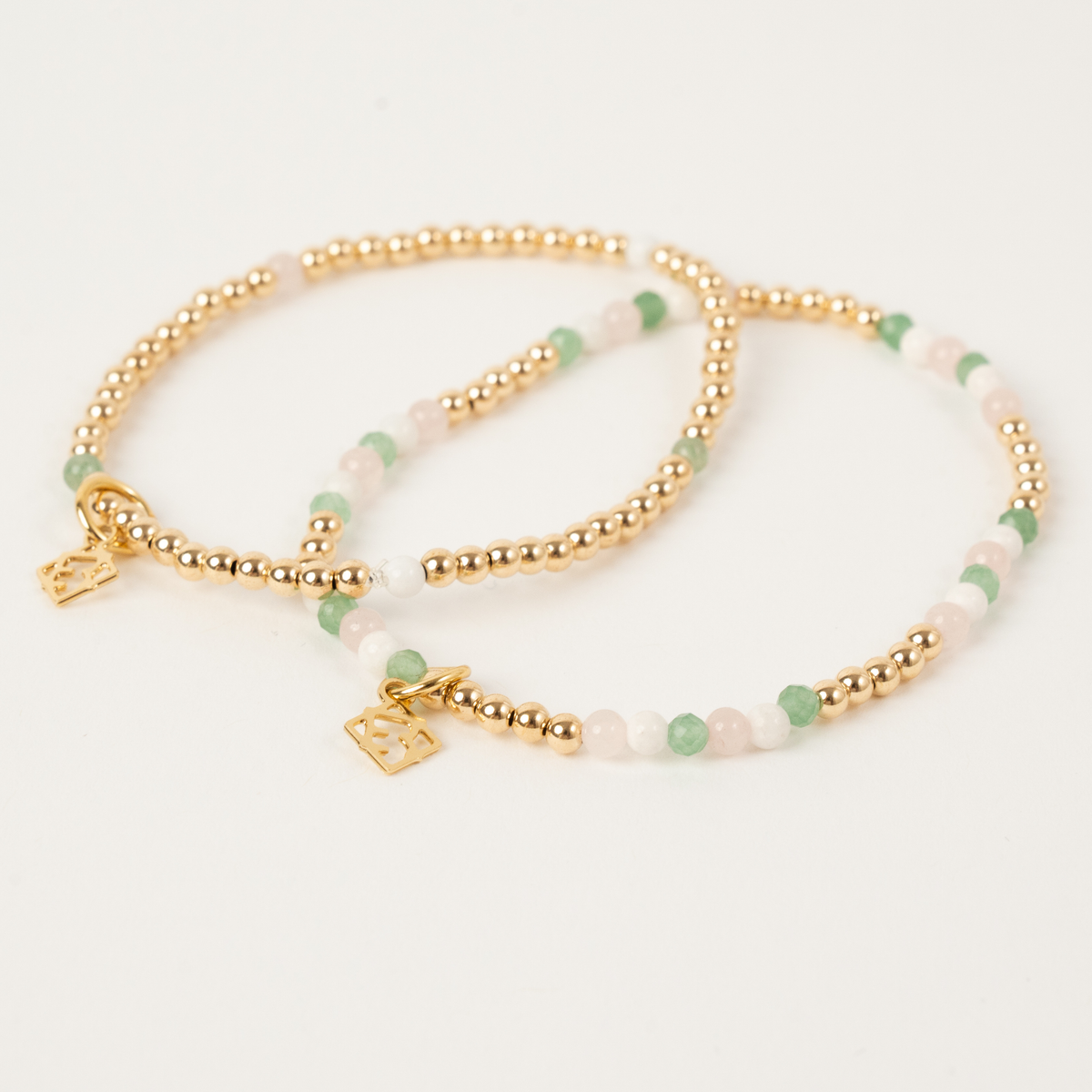 Two Amelia stretch bracelets with 3mm 14K gold-filled beads, rose quartz, white jade and aventurine