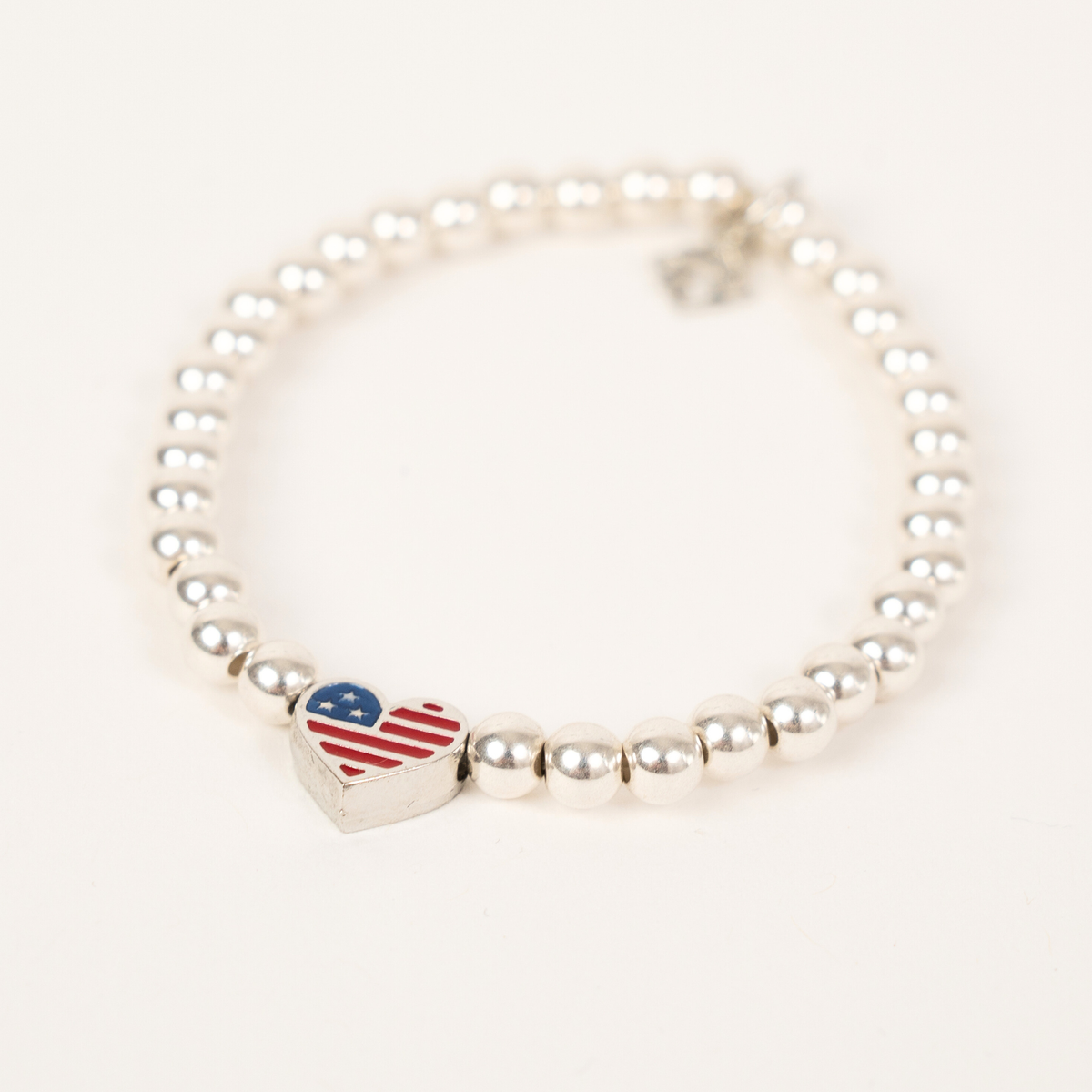 America250 Happy Heart Bracelet with 5mm silver-filled beads and a red, white and blue enamel heart