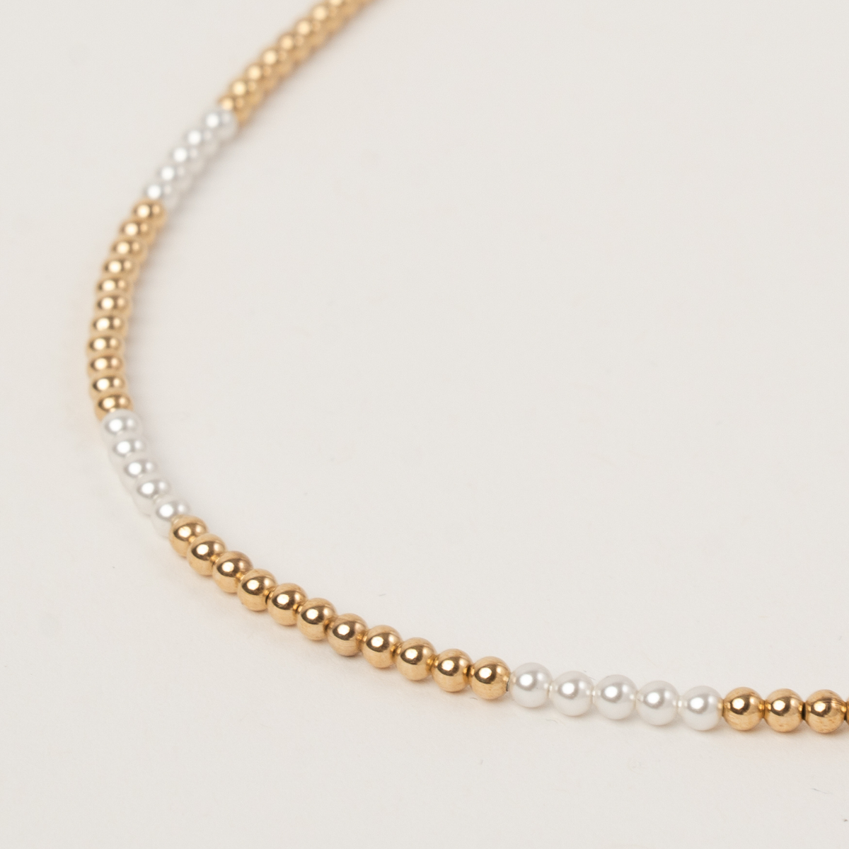 Close-up of the Sincerity Necklace with 3mm 14K gold-filled beads and freshwater pearls